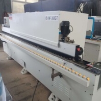 低价出售九九成新的广东宝迈高速全自动封边机