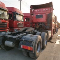 出售17年二手欧曼GTL牵引车国五双驱轻体梁山轻型挂车